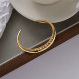 Lyra Gold Bangle - ILLUSIVE JEWELS USA